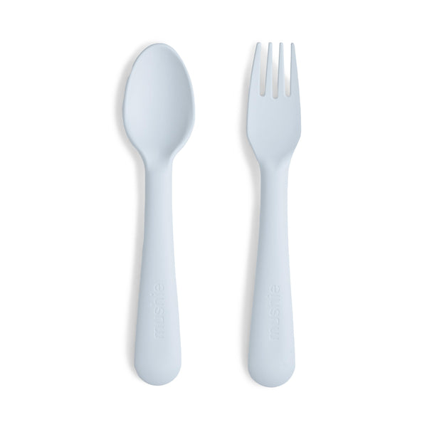 Mushie flatware fork in powder blue close-up, ergonomic grip for little hands.