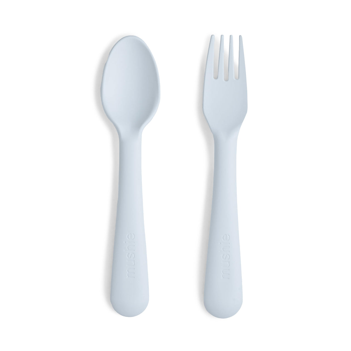 Mushie flatware fork in powder blue close-up, ergonomic grip for little hands.