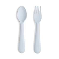 Mushie flatware fork in powder blue close-up, ergonomic grip for little hands.