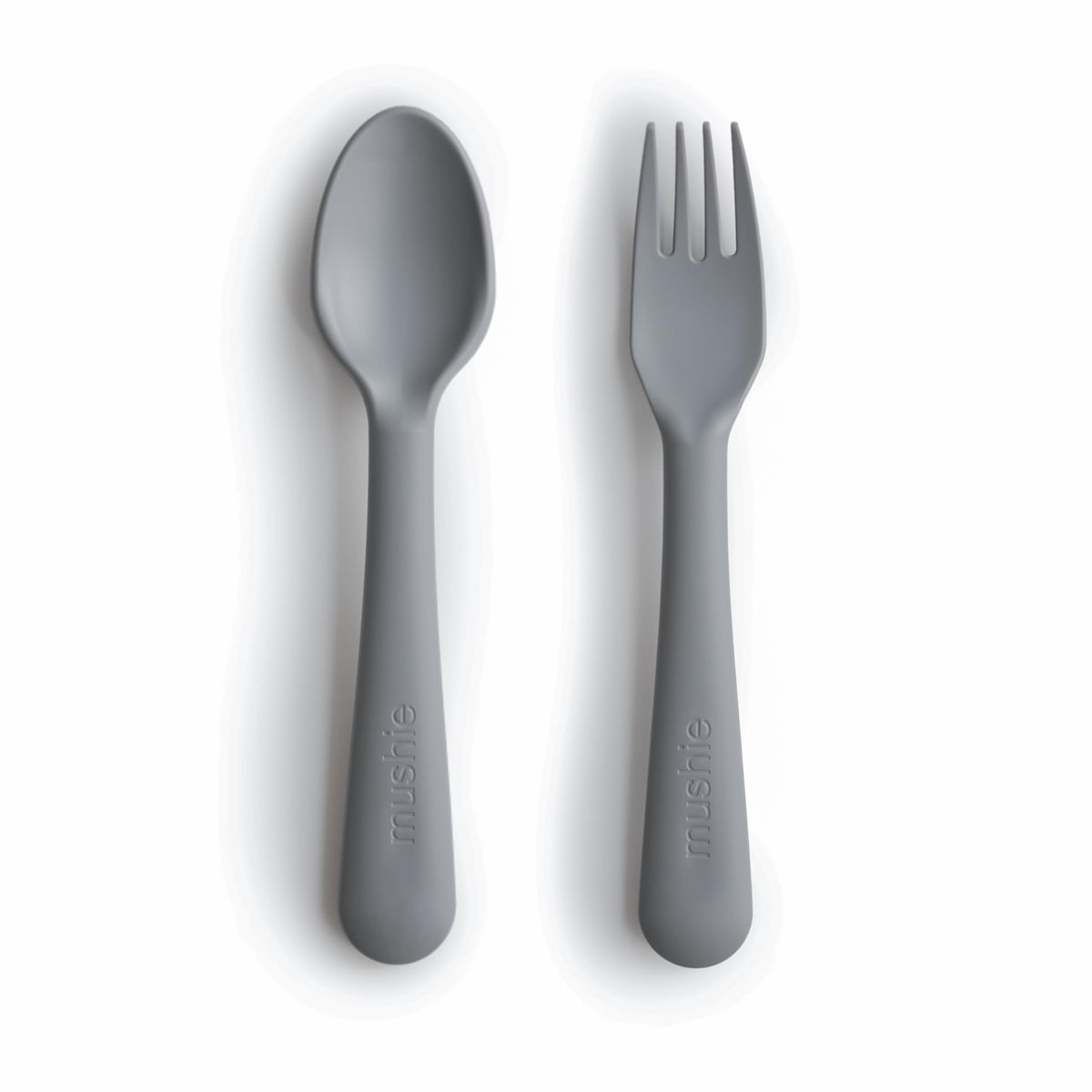 Mushie fork in smoke color with child-friendly grip for easy mealtimes