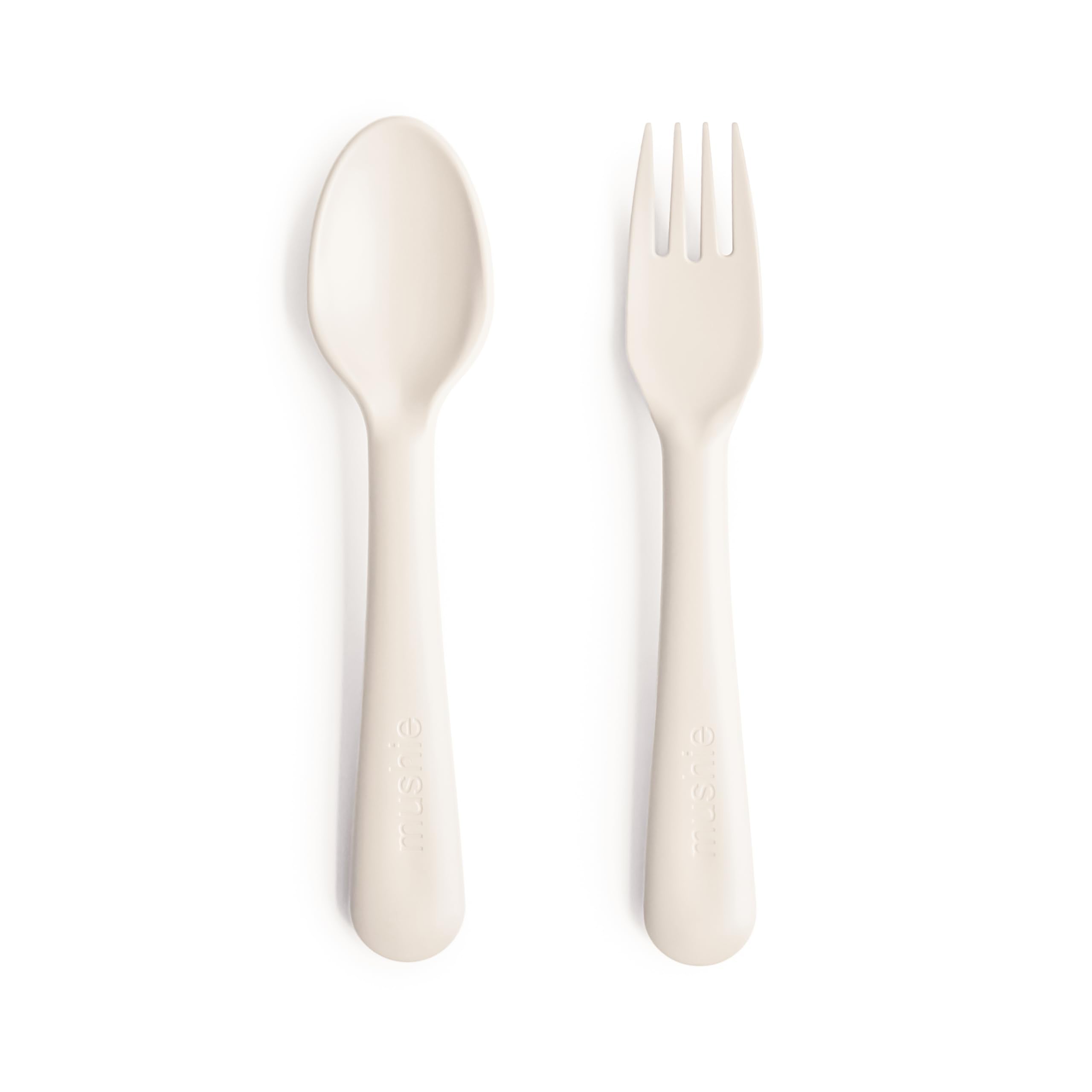 Mushie ivory flatware set for kids with easy-to-hold fork and spoon.