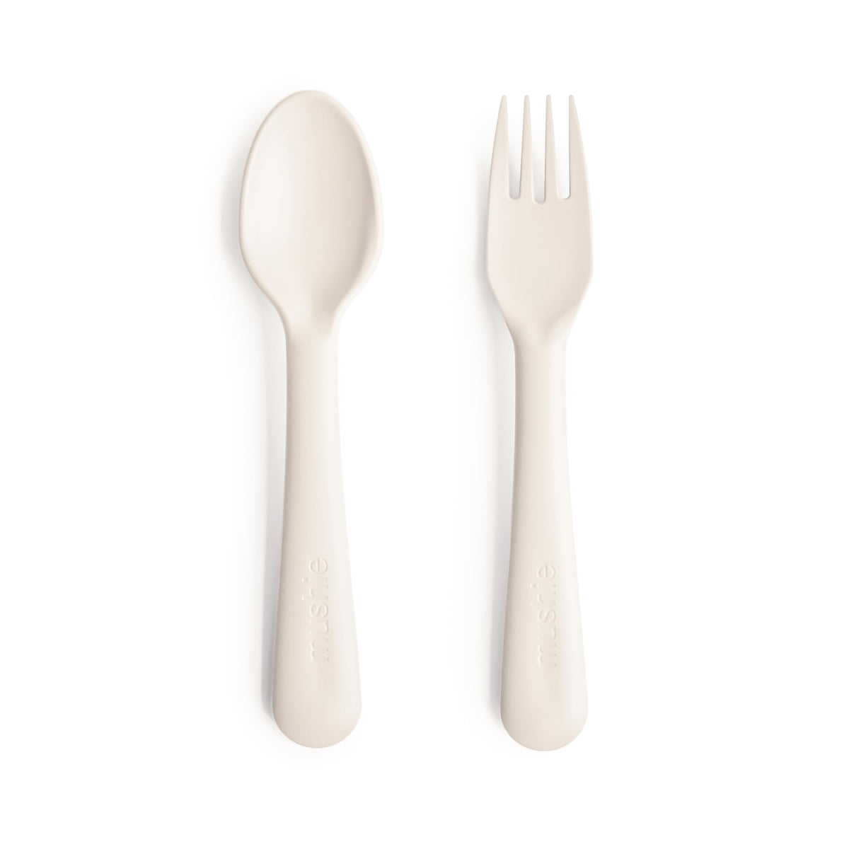 Mushie ivory flatware set for kids with easy-to-hold fork and spoon.
