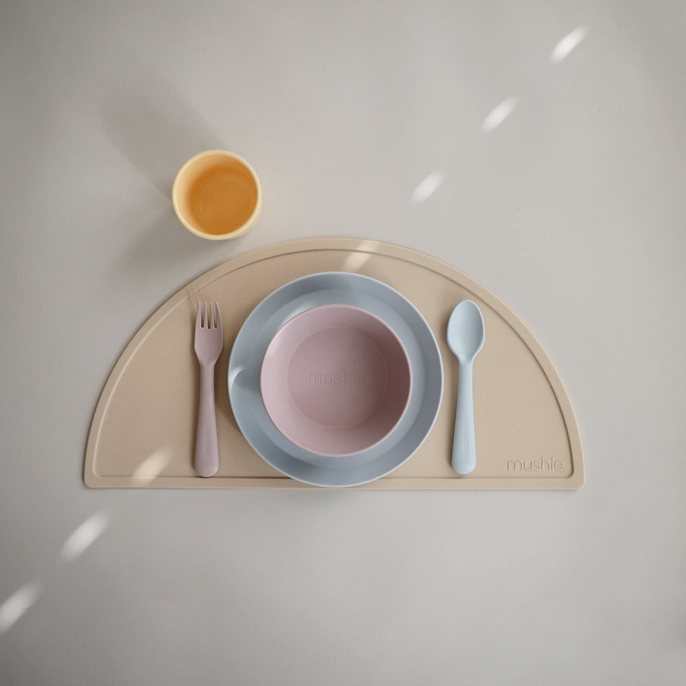 Mushie flatware spoon in powder blue close-up with safe, rounded tip.