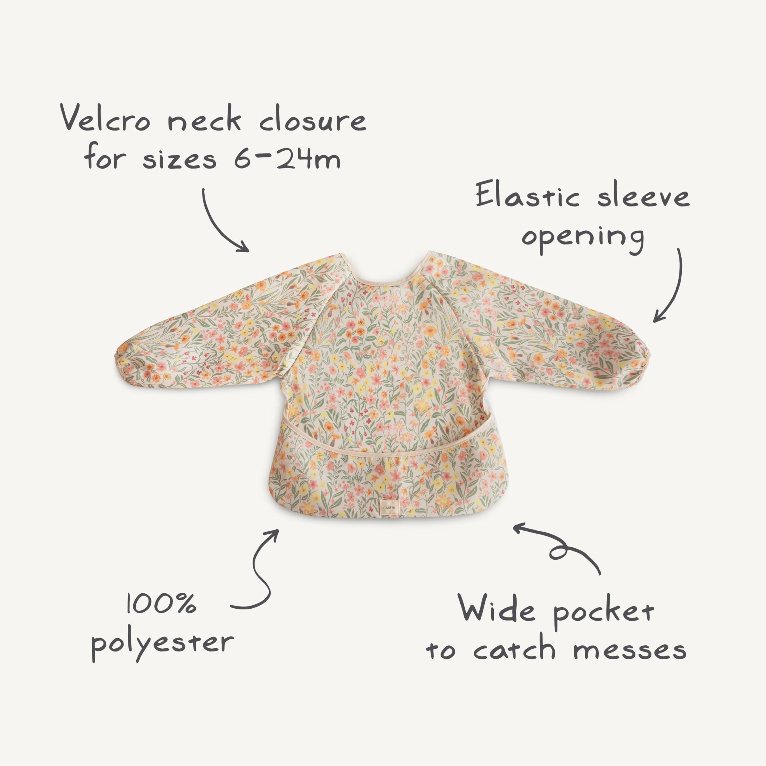Mushie long sleeve bib care tag visible with care guidance