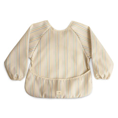 Mushie long sleeve bib front view in retro stripes protects outfits during meals