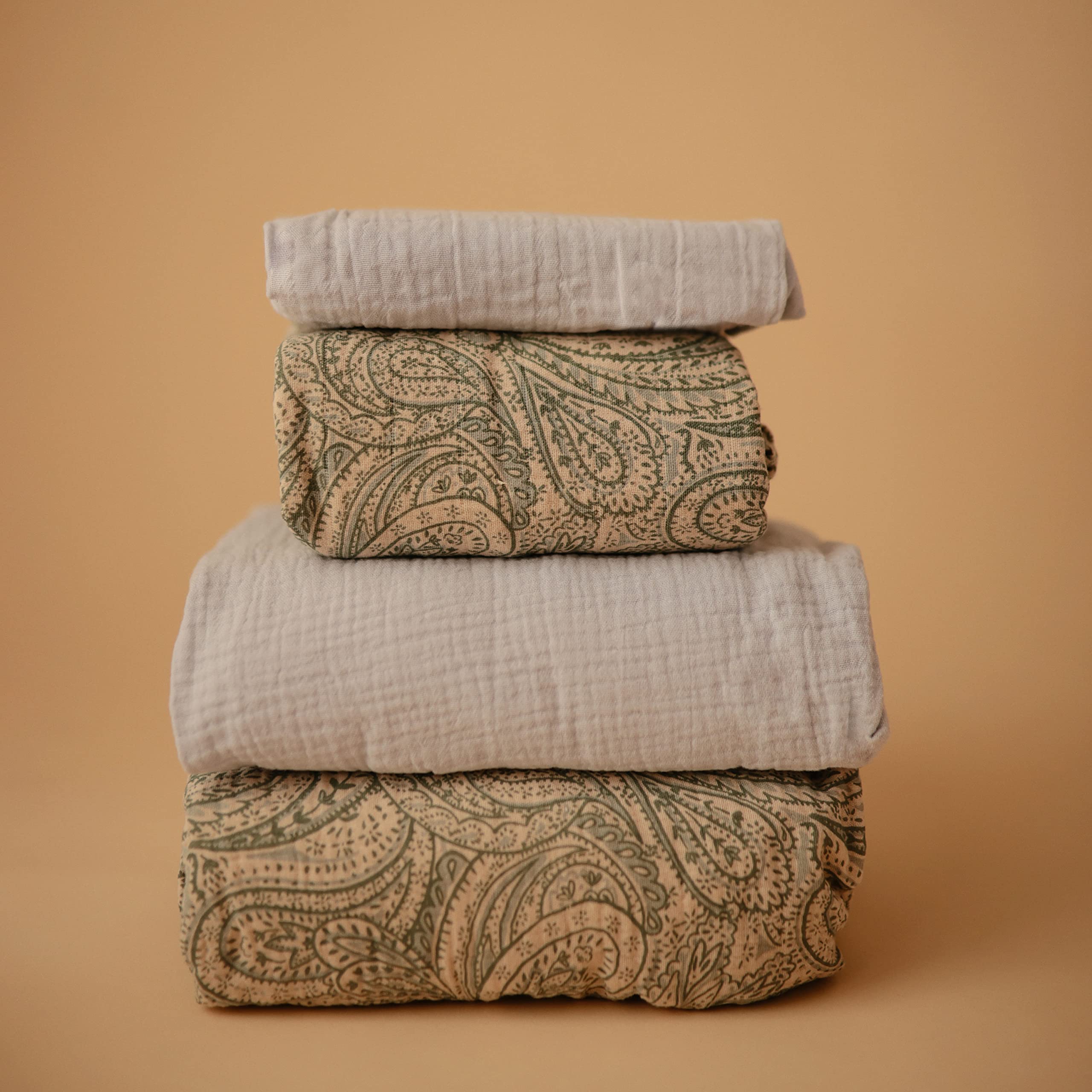 Mushie mini crib sheet with full elastic edge for secure fit