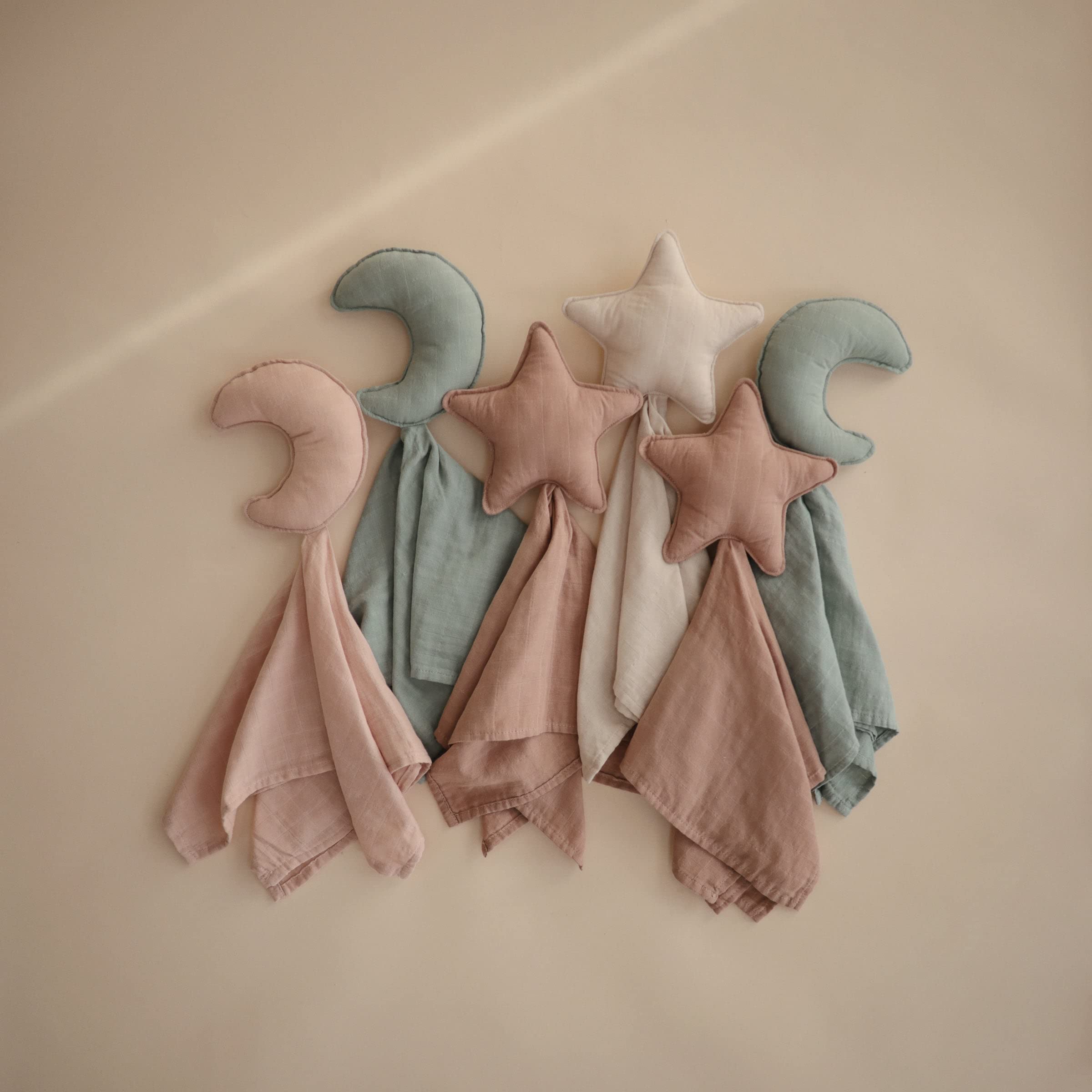 Mushie Moon Security Blanket back view highlights durable muslin material and cozy feel.