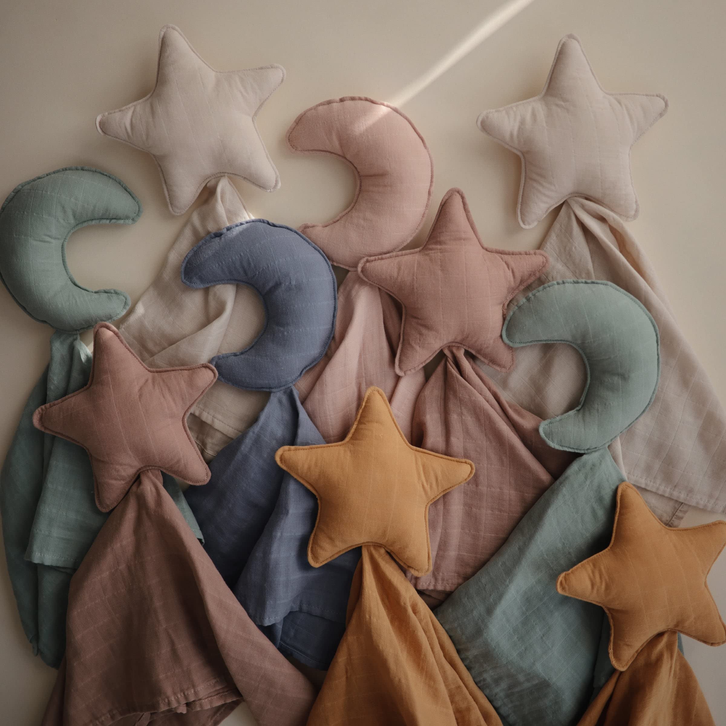 Mushie Moon Security Blanket used during nap time offers soothing familiarity and portability.