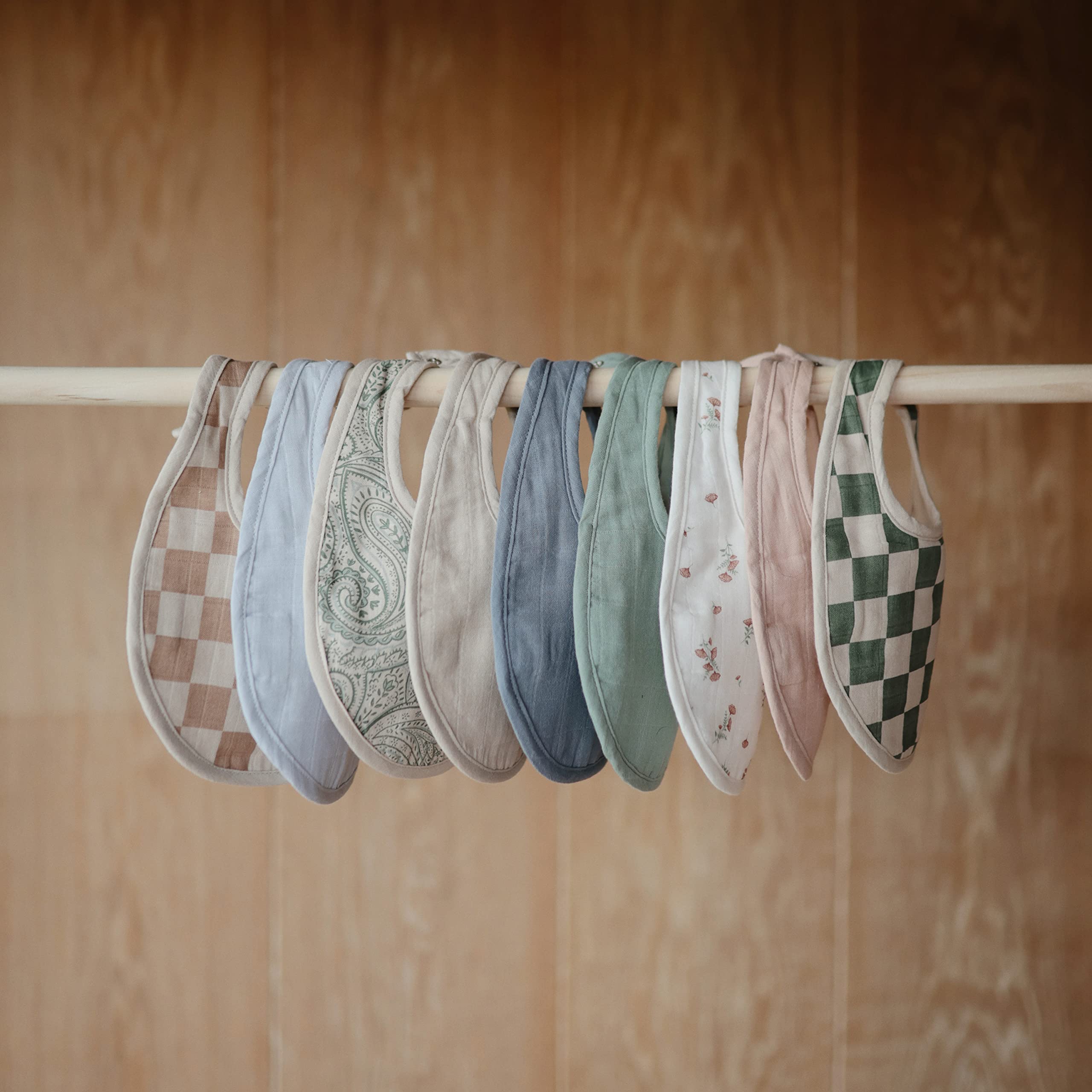Mushie bib in teething time catches dribbles and stays comfy.