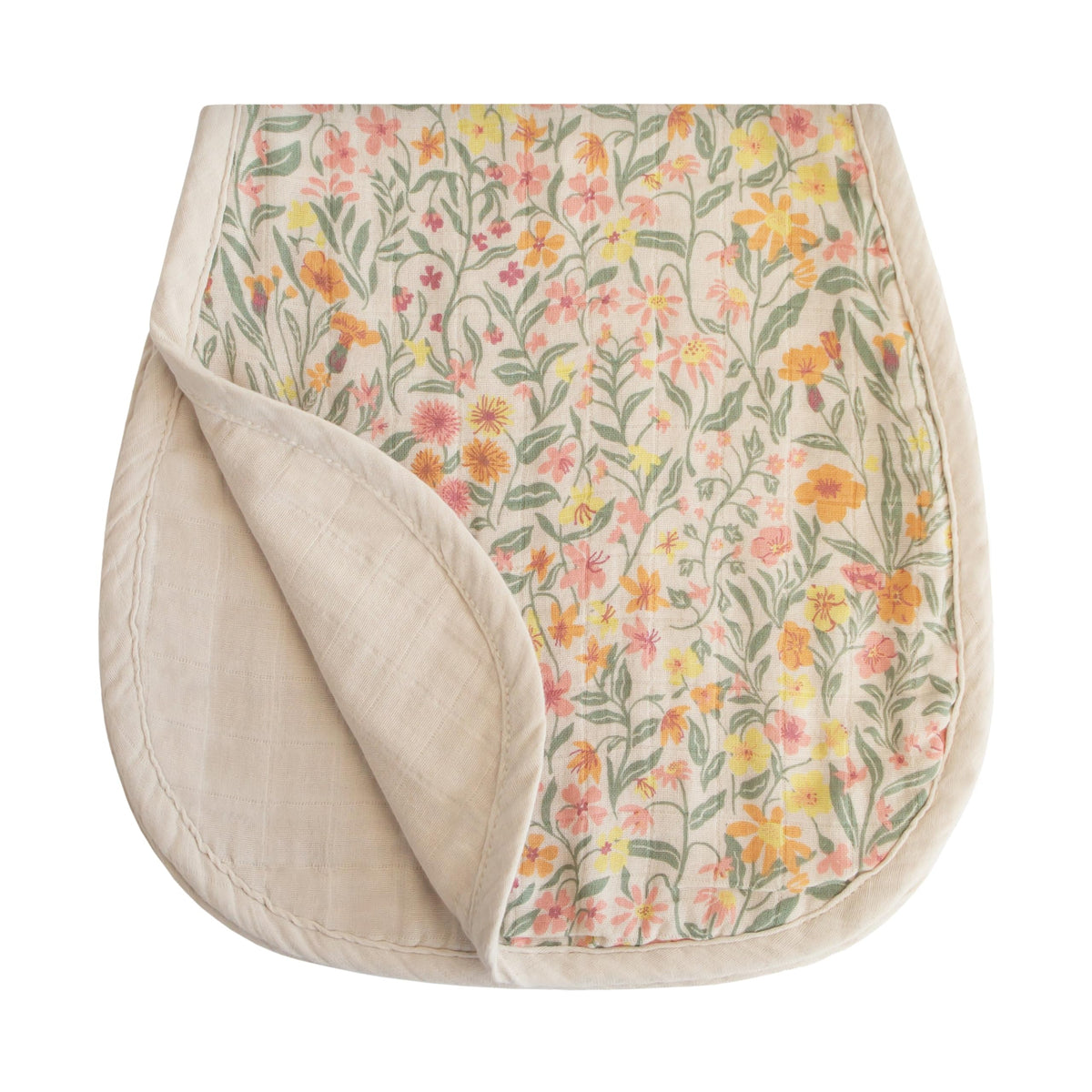 Mushie muslin burp cloth in pastel blooms close-up shows soft organic cotton texture.