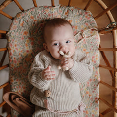 Mushie muslin fabric close-up highlighting soft texture and breathable weave.