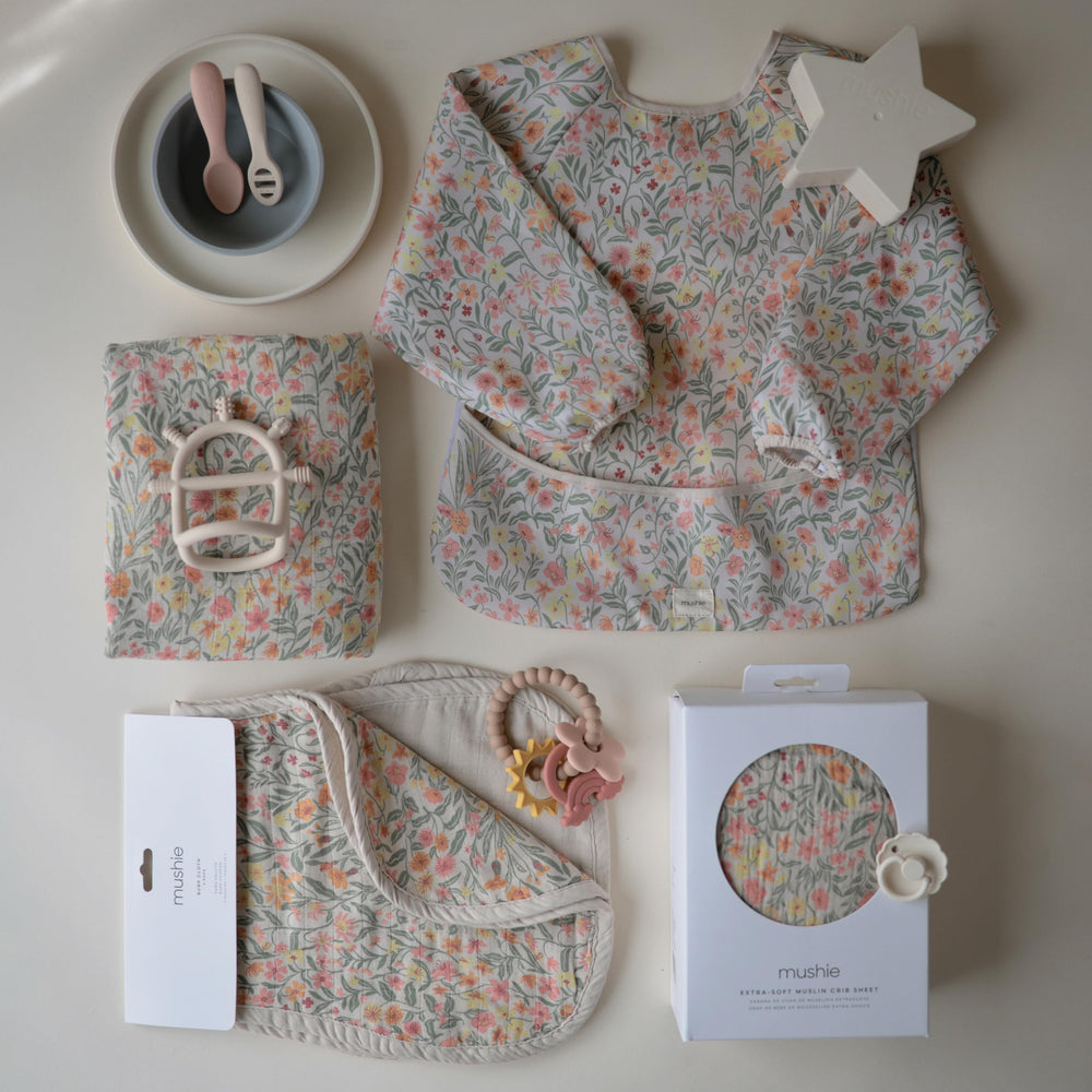 Mushie organic muslin burp cloth demonstrates soft, durable daily use.