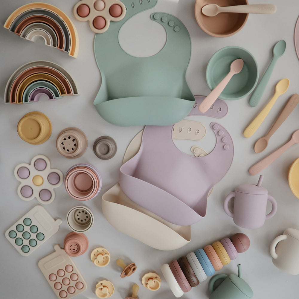 Mushie packaging display featuring two-pack spoons for easy stocking.