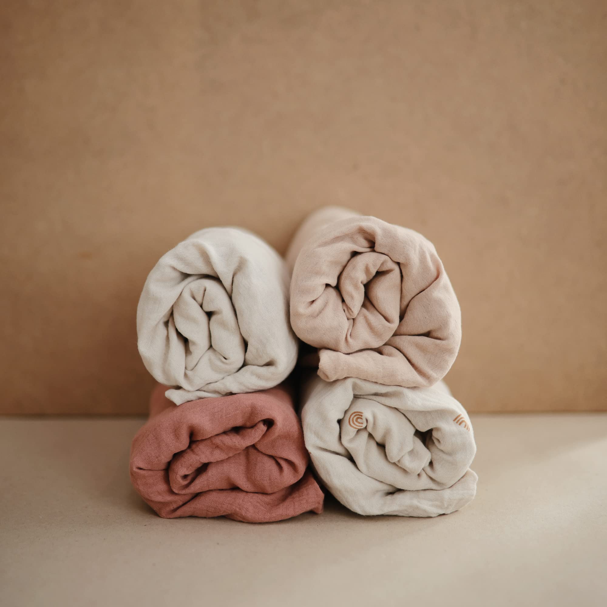 Pre-washed cotton Mushie muslin offers a soft, breathable feel