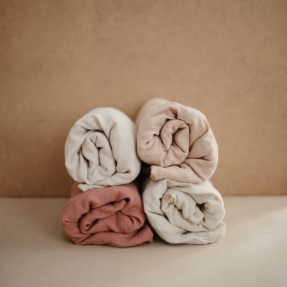 Pre-washed cotton Mushie muslin offers a soft, breathable feel