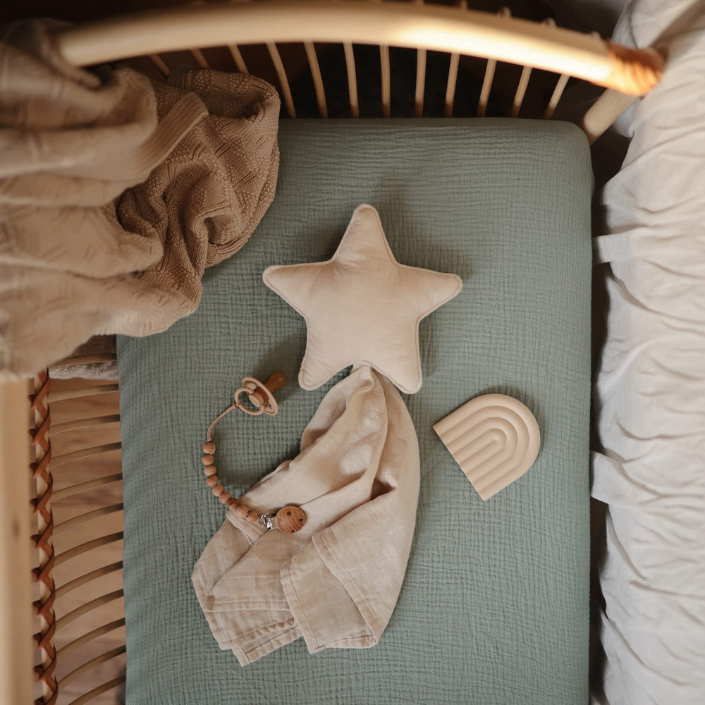 Mushie pre-washed softness mini crib sheet ensures gentle feel after washing
