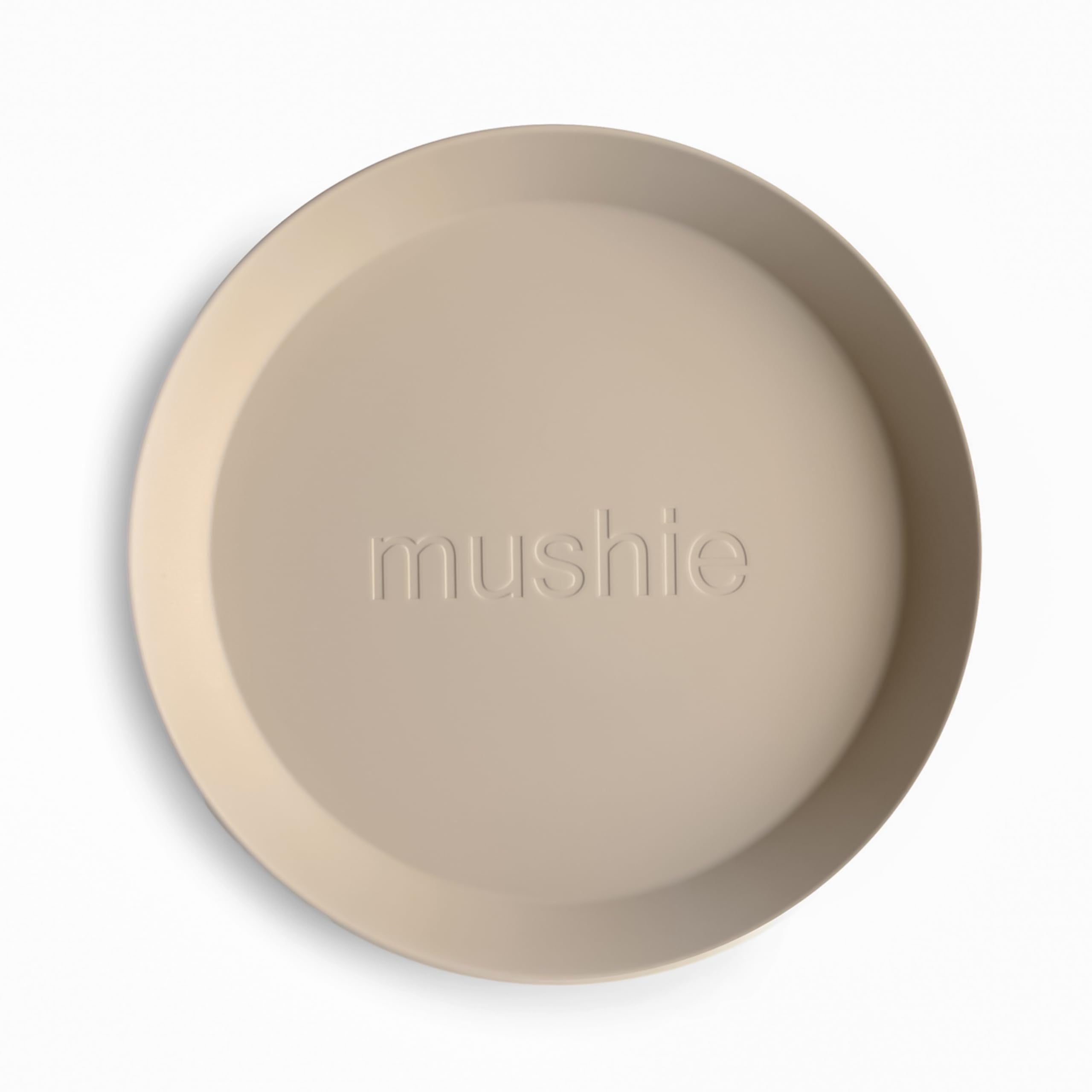 Mushie vanilla plate for kids, lightweight design ideal for little hands.