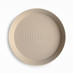 Mushie vanilla plate for kids, lightweight design ideal for little hands.