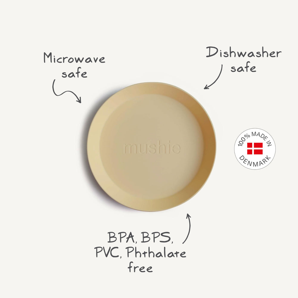 Mushie round plate highlights calm aesthetics, reduces mealtime clutter.