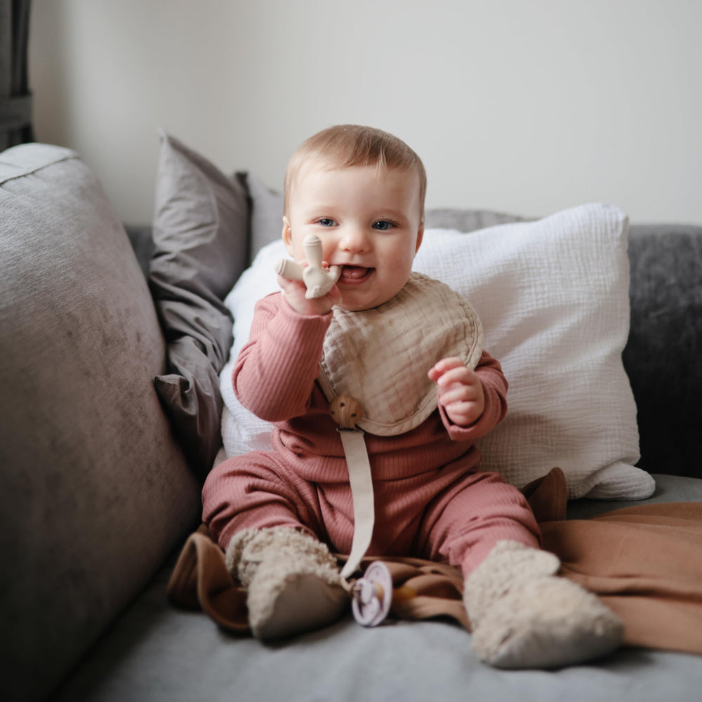 Mushie teether safe materials close-up emphasizes non-toxic, baby-safe design