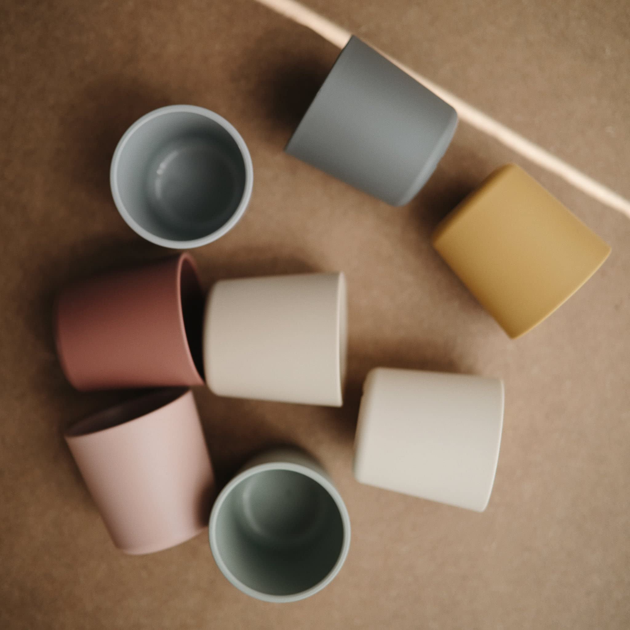 Mushie Sage cups used at mealtime, safe for everyday use.