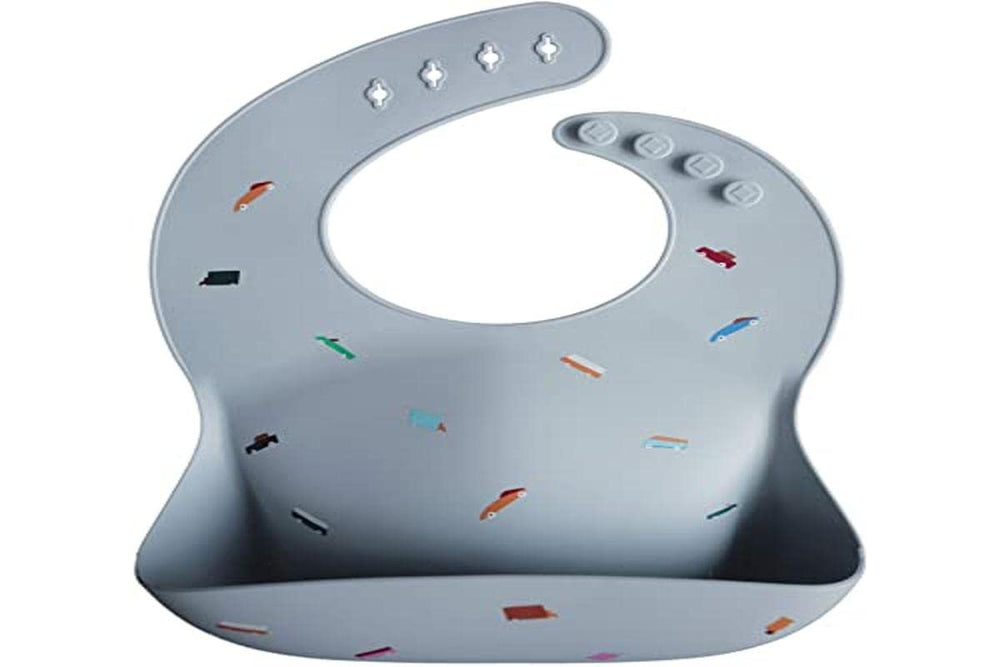 mushie silicone baby bib deep-pocket catches crumbs, easing cleanup.