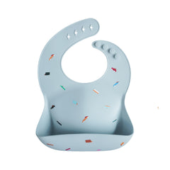 mushie silicone baby bib with retro cars closed neck provides a snug fit and mess control.