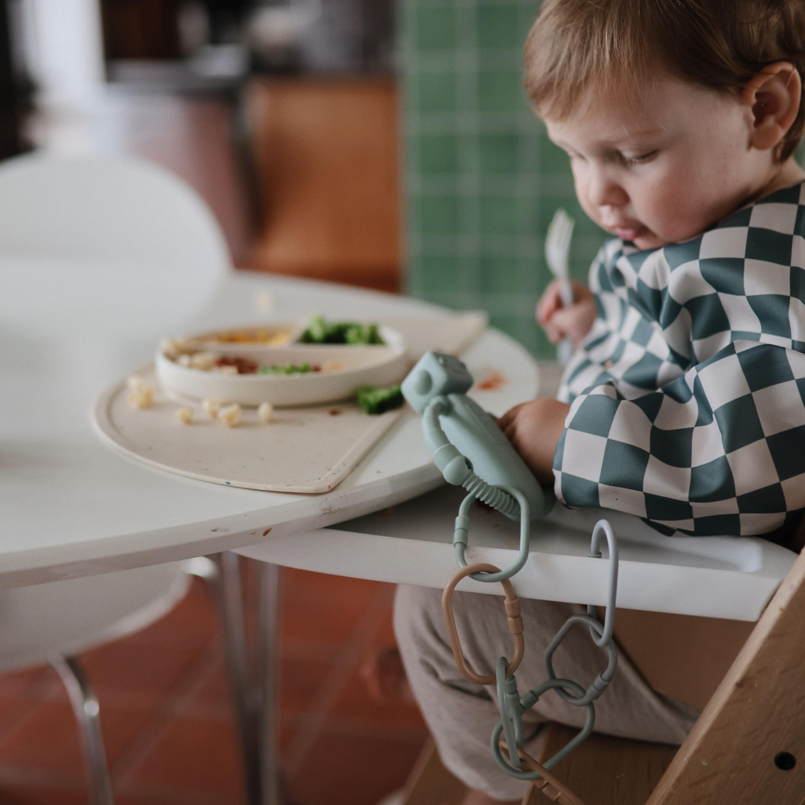 Mushie silicone teether toy supports small hands and quick cleanup.