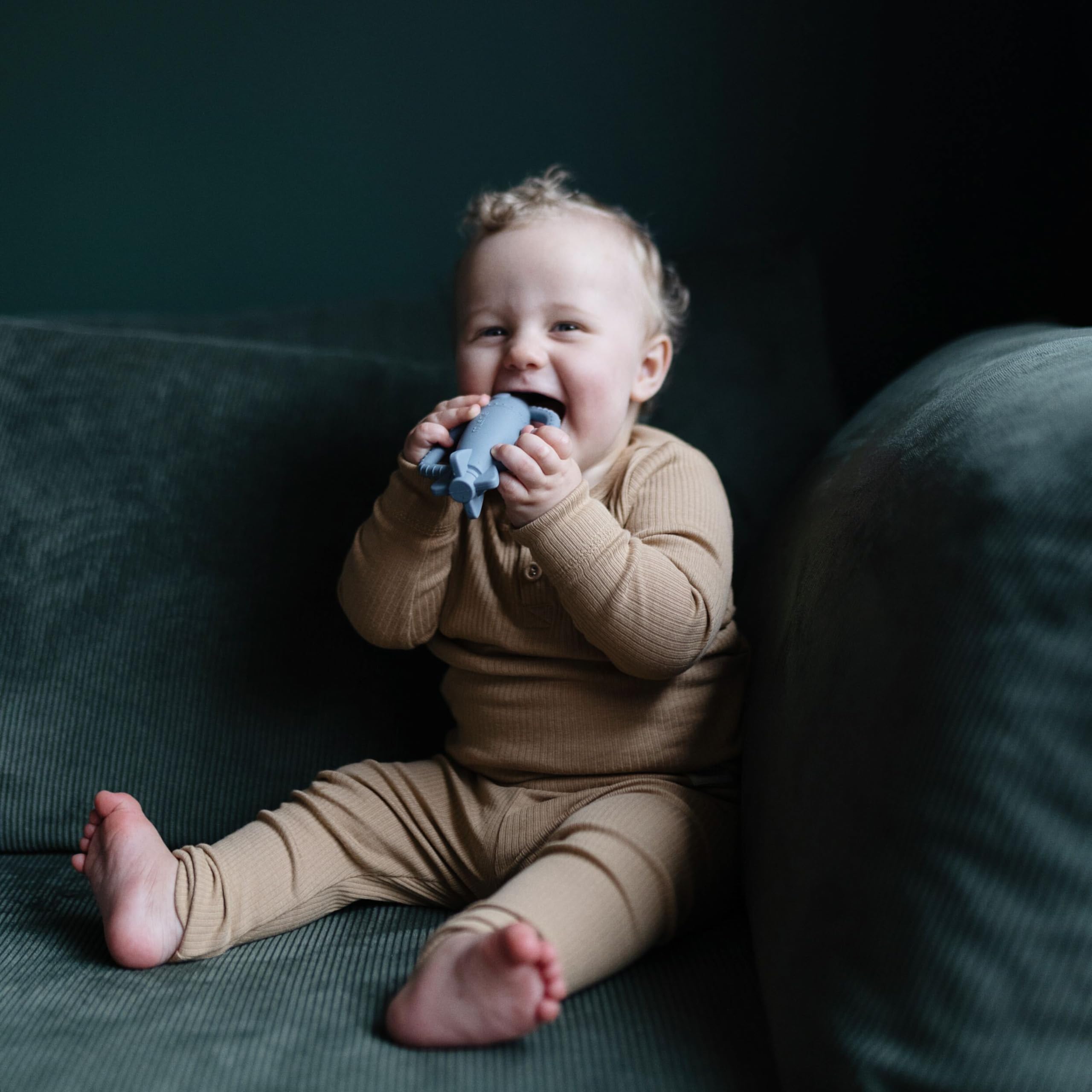 Mushie easy-clean surface highlights quick cleanup after playtime