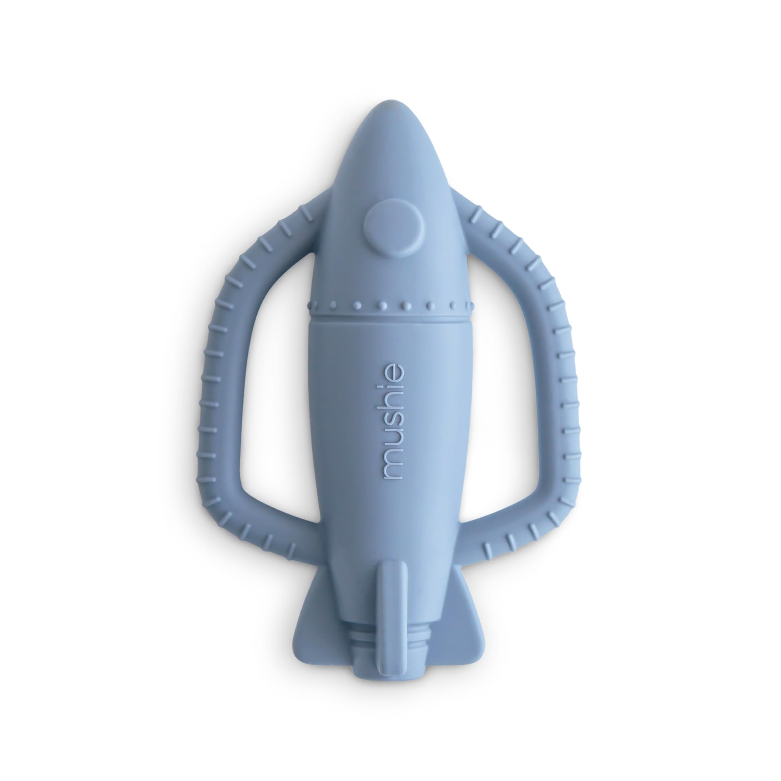 Mushie rocket rattle teether held by tiny hands for gentle teething play