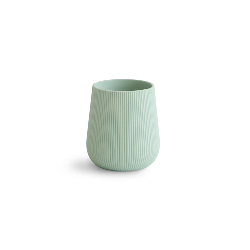 Mushie Cambridge Blue starter cup with outer ribbed texture for a secure grip.
