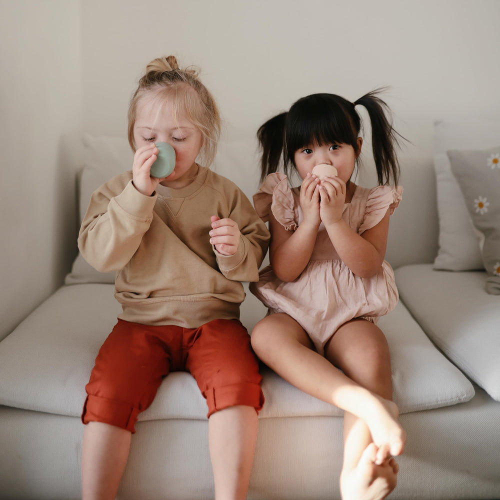 Small two-ounce capacity supports gentle practice sips for beginners.