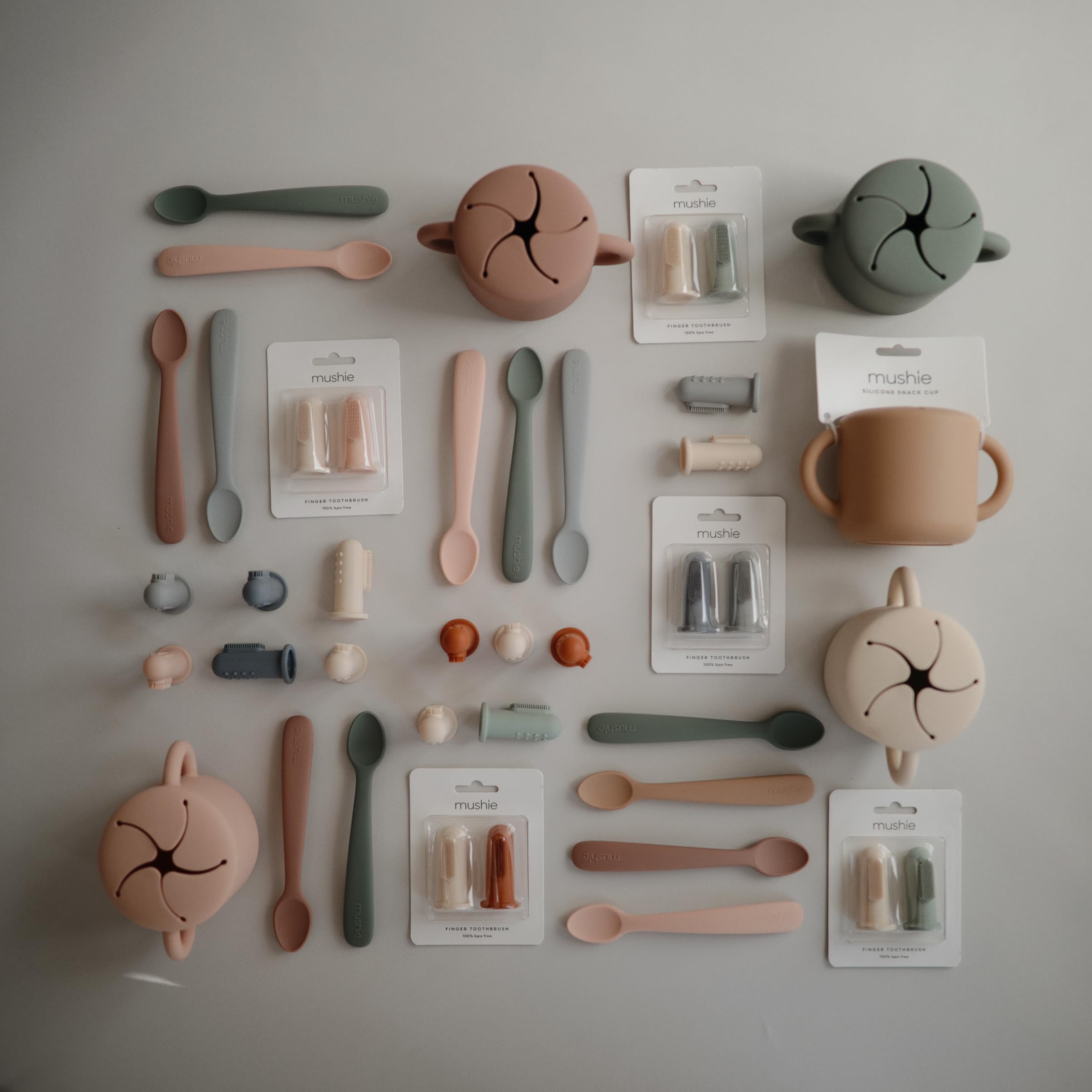 Mushie snack cup in natural color suits travel and daily routines.