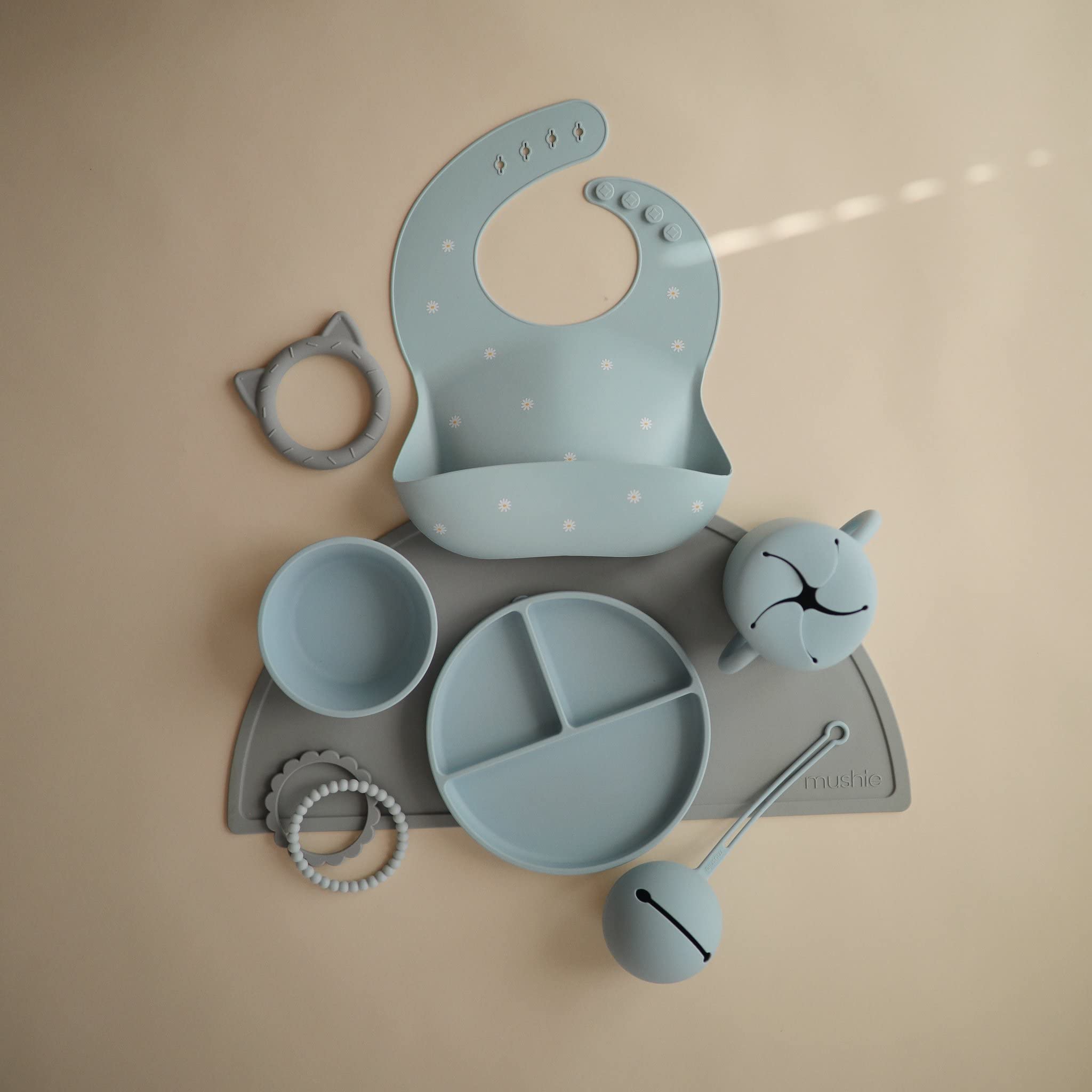Mushie silicone snack cup powder blue no-slip bottom prevents sliding during meals