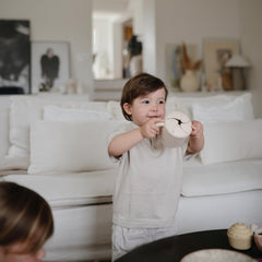 Dishwasher-safe Mushie snack cup easy cleaning after meals.