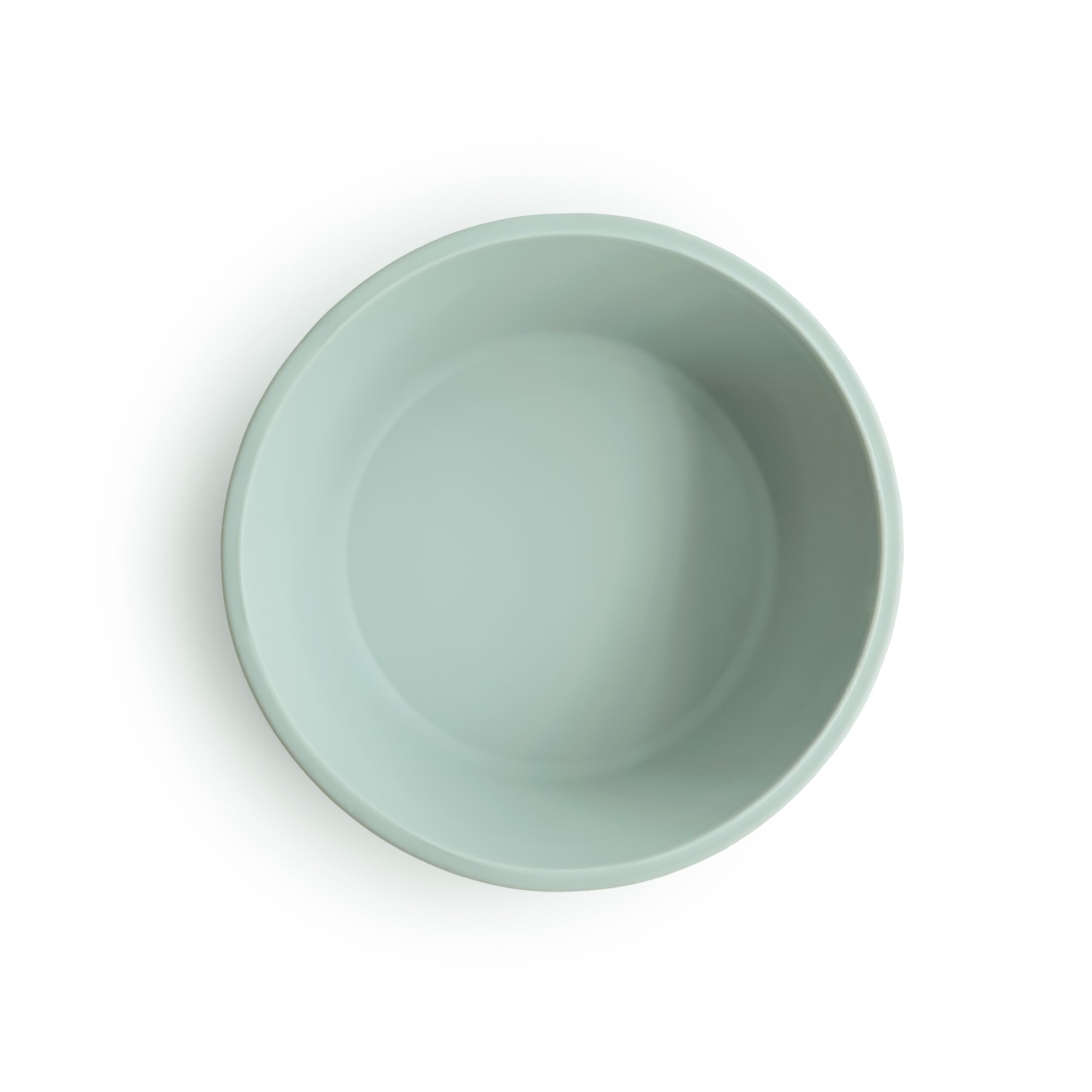 Close-up of Mushie bowl showing smooth silicone and secure suction on clean surfaces.