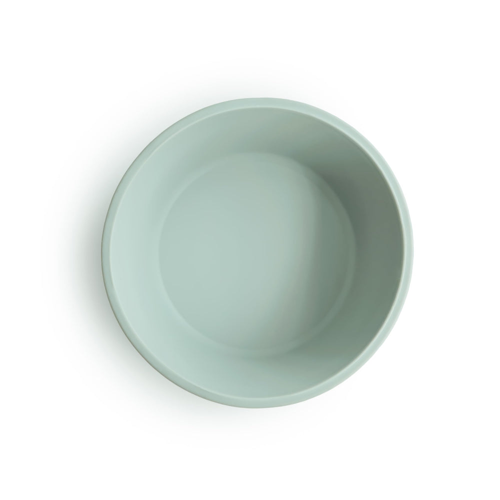 Close-up of Mushie bowl showing smooth silicone and secure suction on clean surfaces.