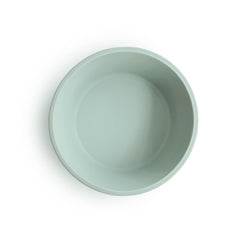 Close-up of Mushie bowl showing smooth silicone and secure suction on clean surfaces.