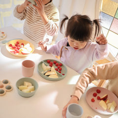 Mushie Cambridge Blue bowl shown on a tidy dining table for easy setup.
