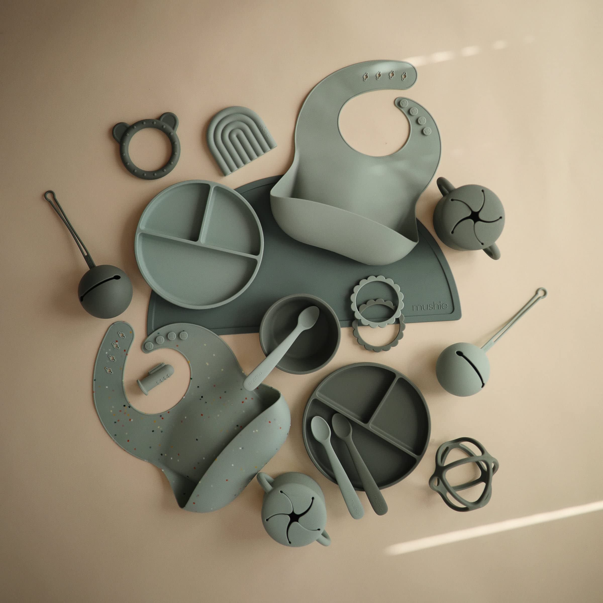 Close-up of Mushie silicone material highlighting heat-safe plate for warming food safely
