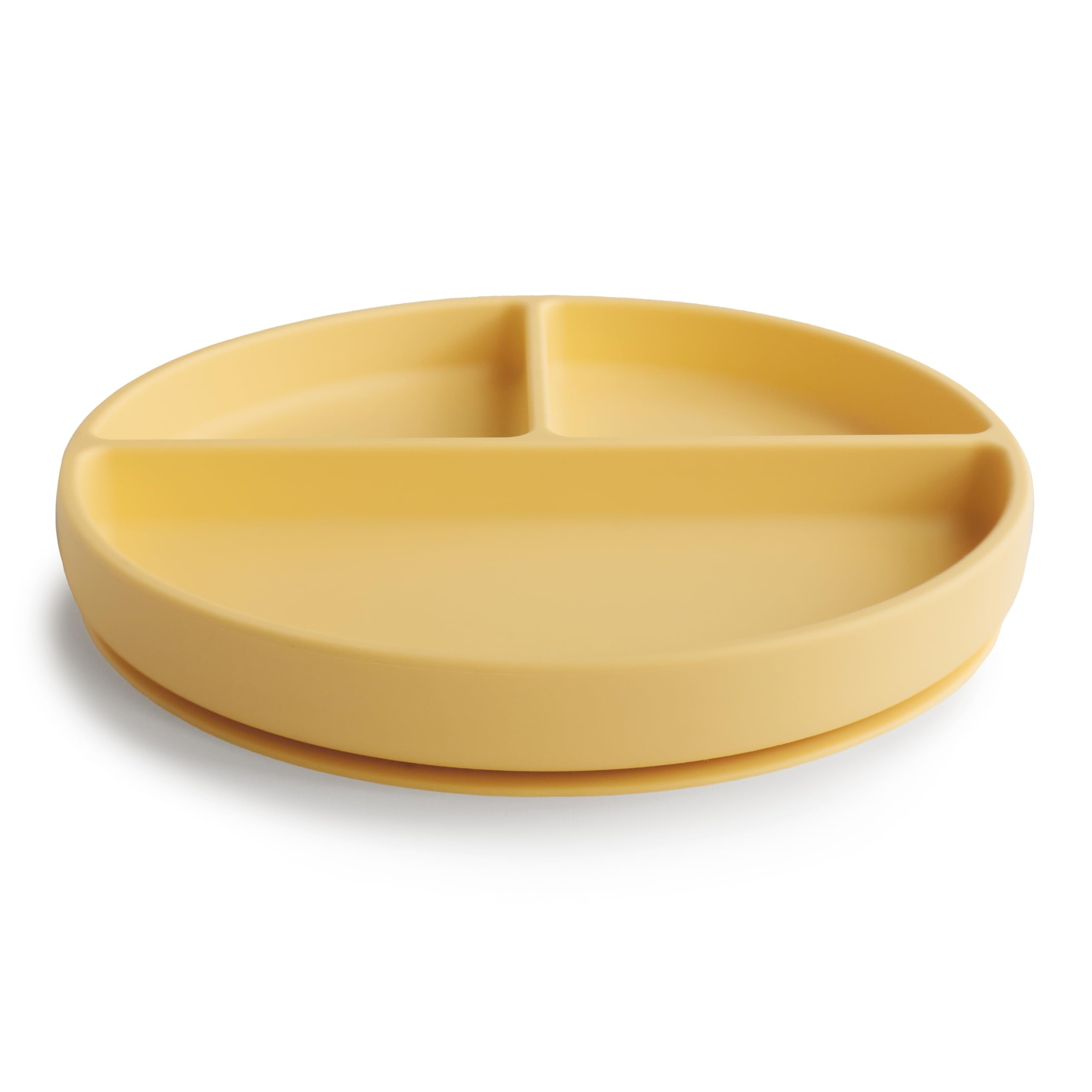 Mushie suction base close-up highlighting strong grip for self-feeding