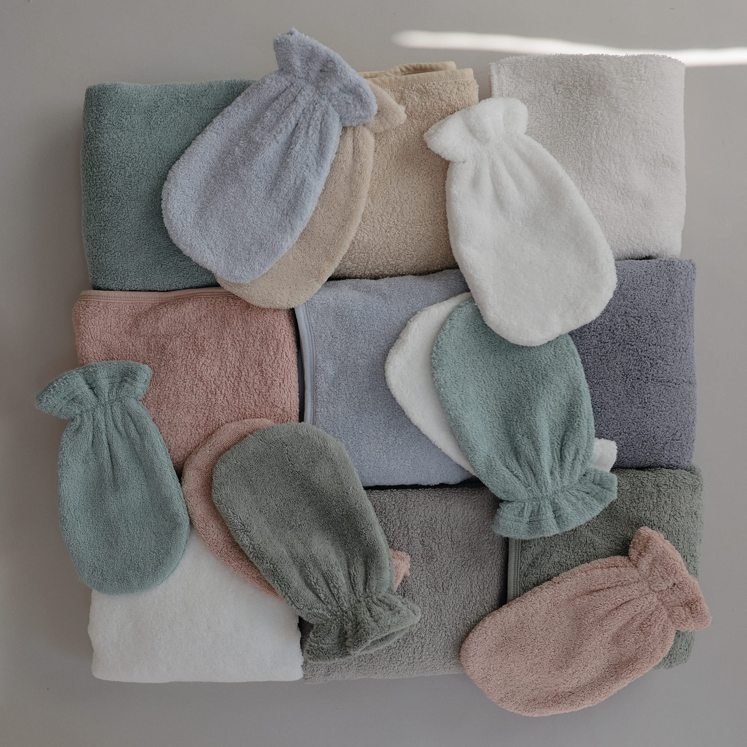Mushie soft corner detail highlights durable stitching and comfort.