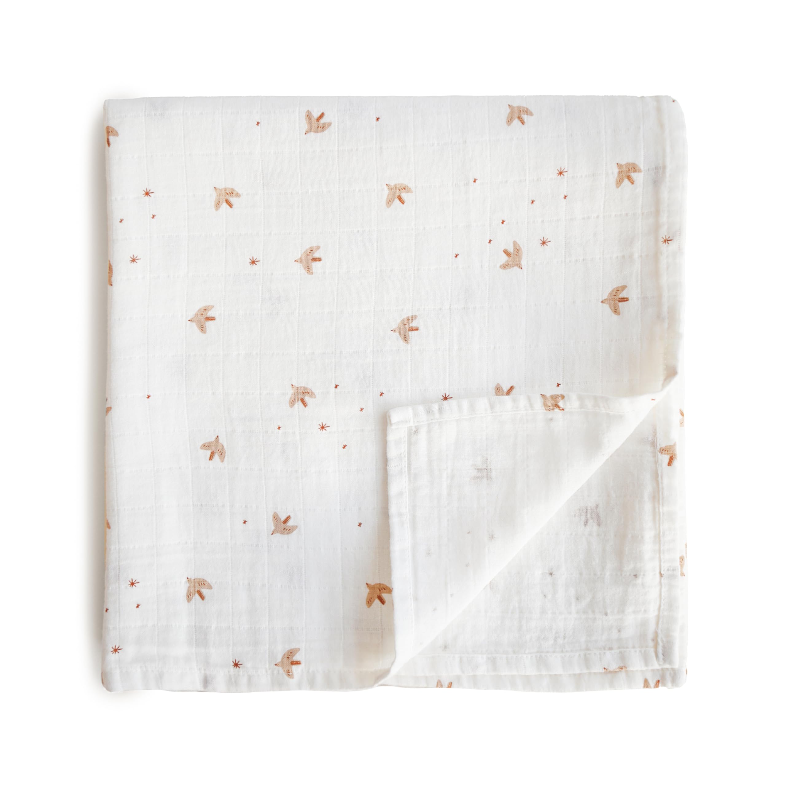 Mushie Sparrow muslin swaddle blanket with soft, breathable fabric for peaceful baby naps.