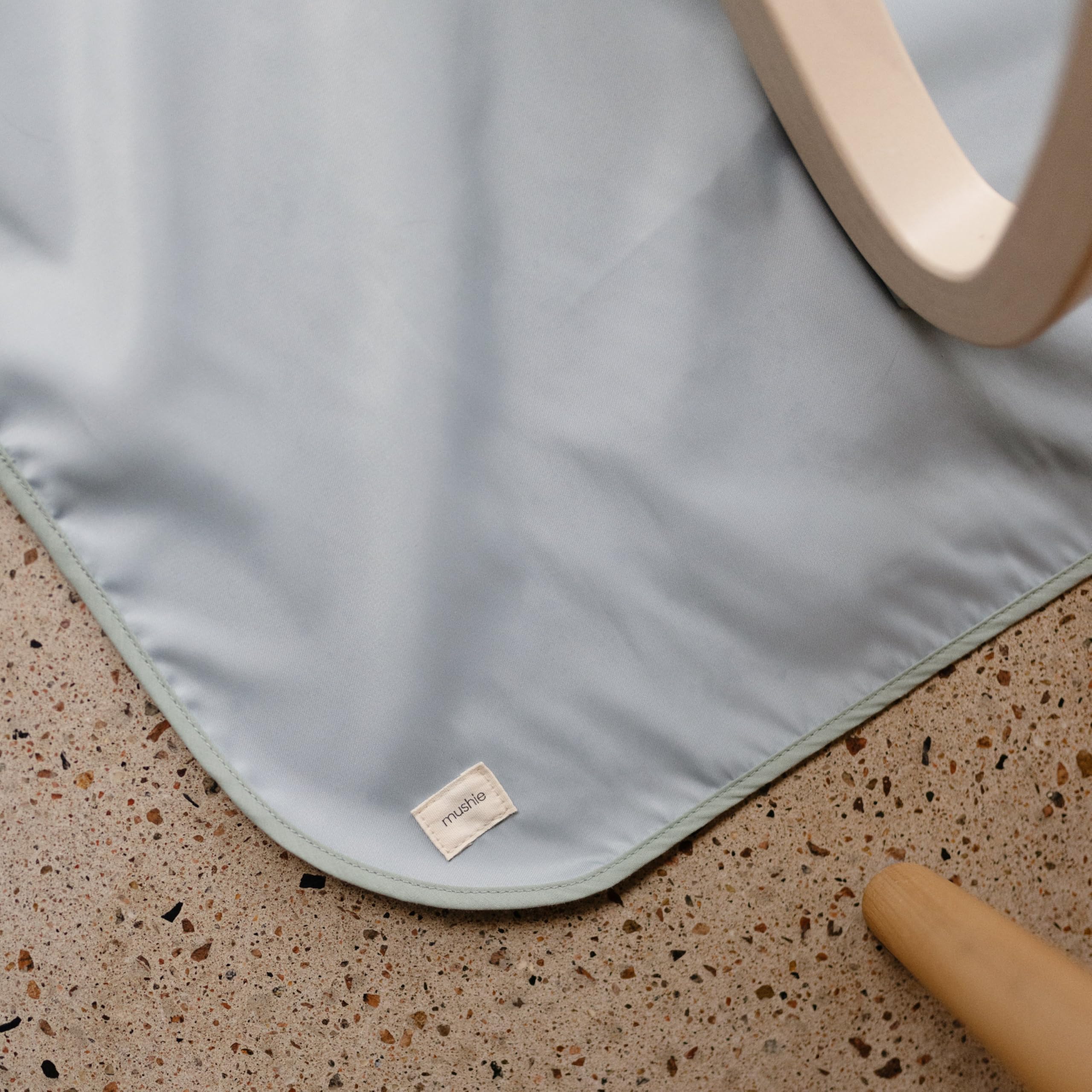 Mushie Splat Mat foldable design fits in a diaper bag