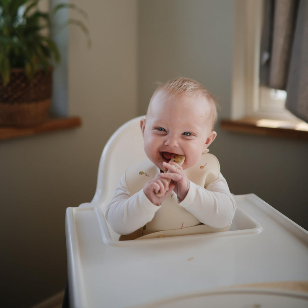 Mushie spoon dimensions suit small mouths for easy scooping.