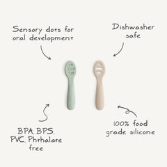 Mushie stage-2 spoon with open slots helps scoop thicker foods confidently.