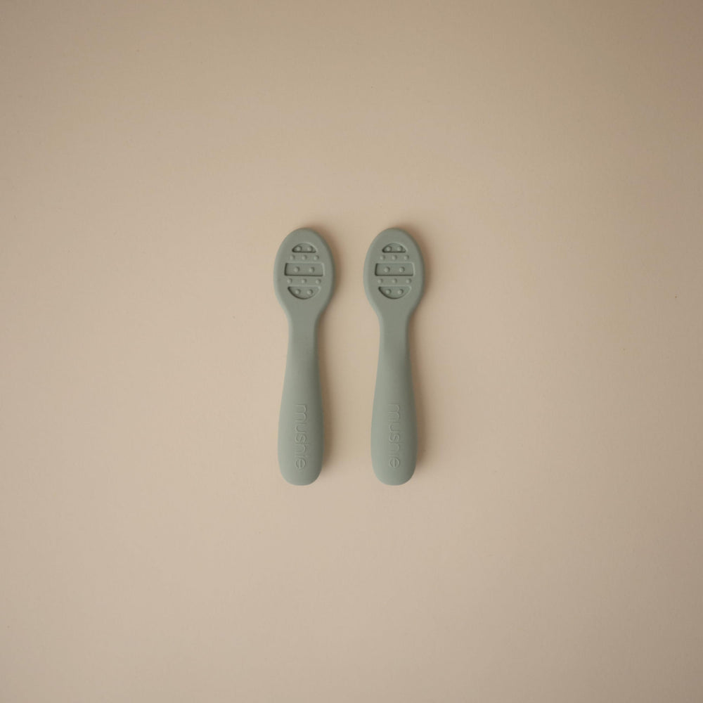 Stage 1 solid-surface Mushie spoon helps thin purees and yogurts easily.
