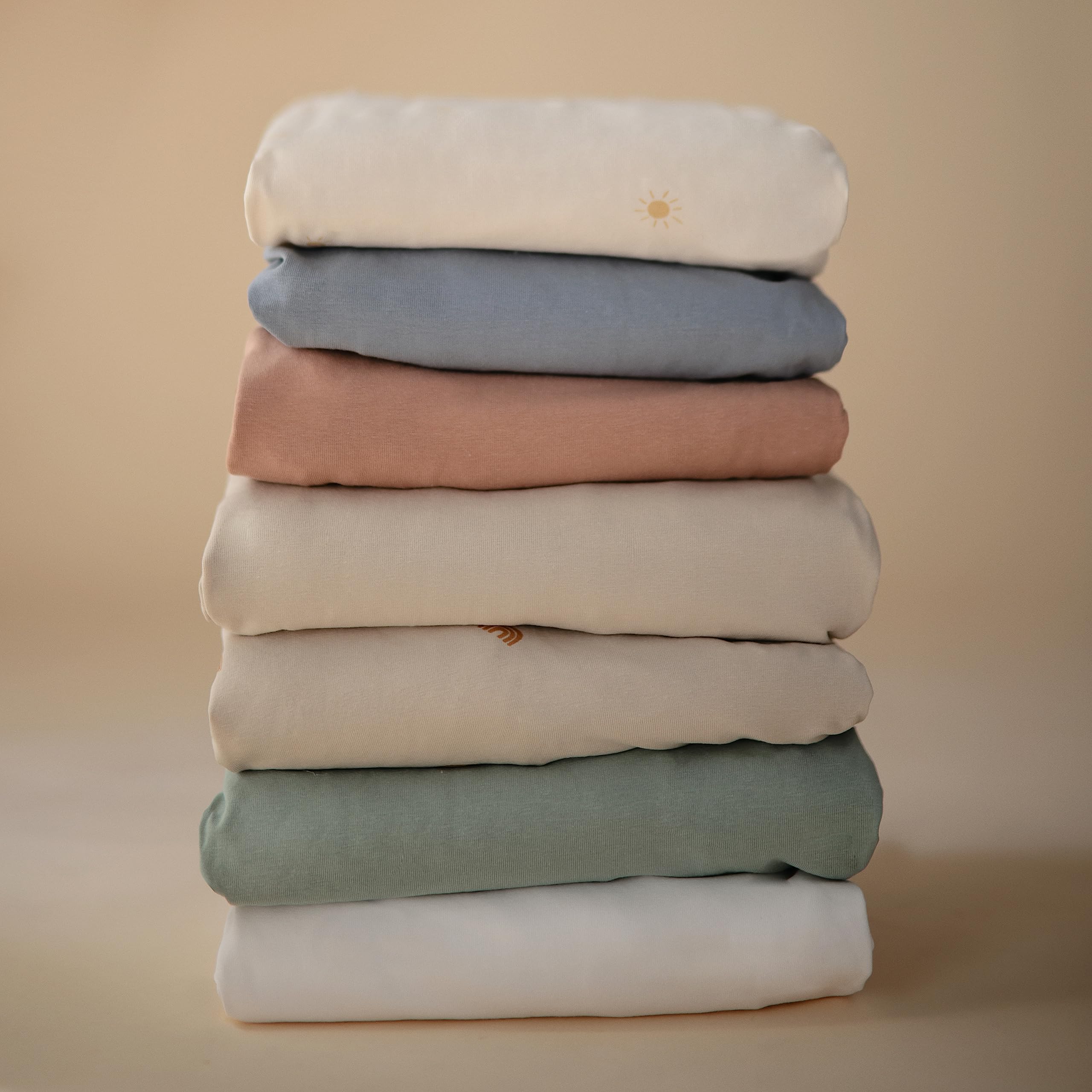 Mushie blush crib sheet soft prewashed fabric for everyday comfort