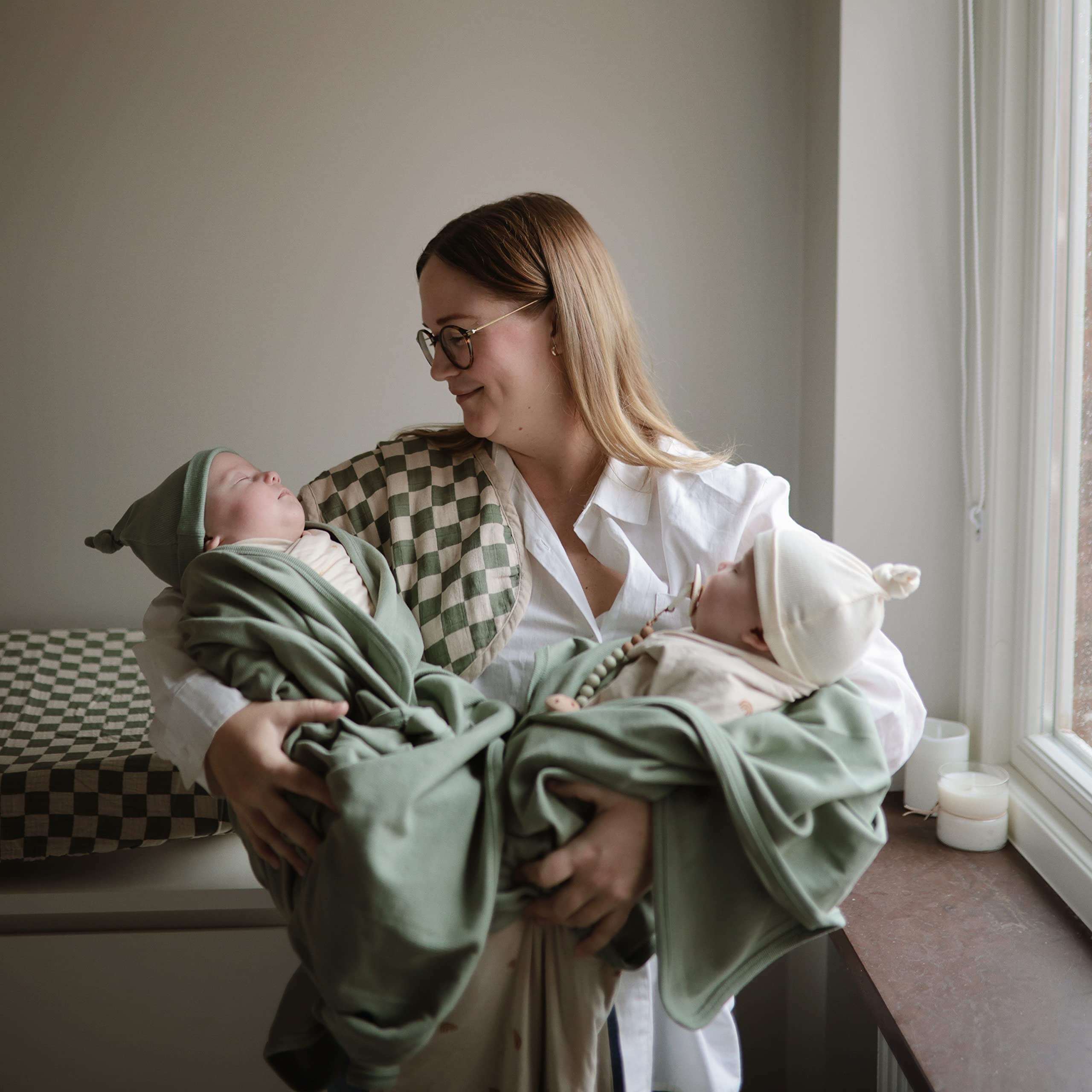 Dried Thyme color Mushie swaddle, breathable and cool to touch.