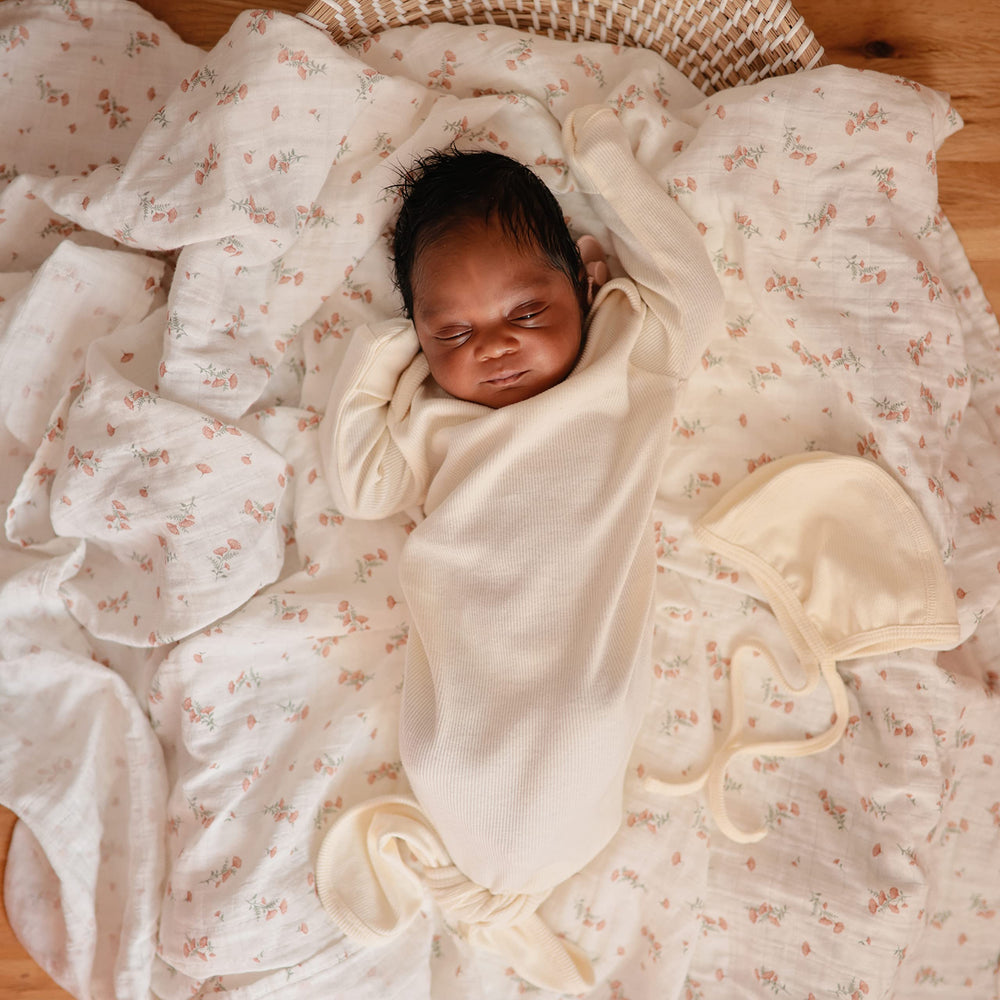 Mushie 47x47 inch swaddle provides generous coverage for flexible wraps and naps